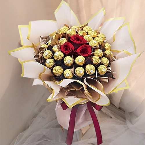 Ferrero And Rose Arrangement